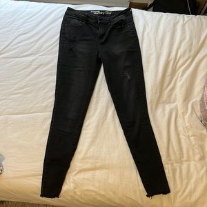 Black mid-rise skinny jeans - Hippie Laundry - ripped hem, small rips